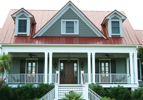 red metal roof on grey house|gray house with red trim.